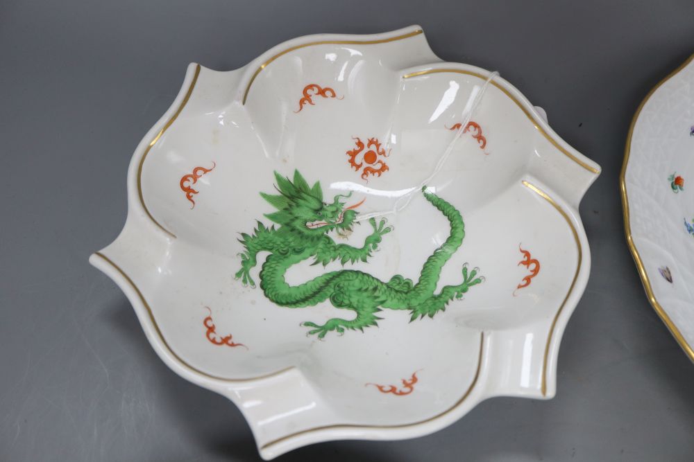 A set of three late Meissen plates with floral decoration and a modern Meissen dragon bowl